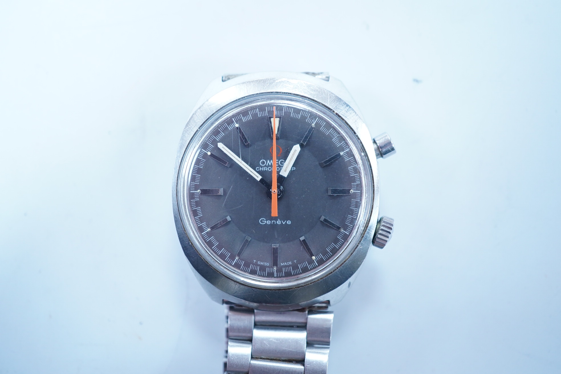 A gentleman's late 1960's? stainless steel Omega Chronostop manual wind wrist watch, with baton numerals, case diameter 33mm, on an associated stainless steel strap. Condition - poor to fair